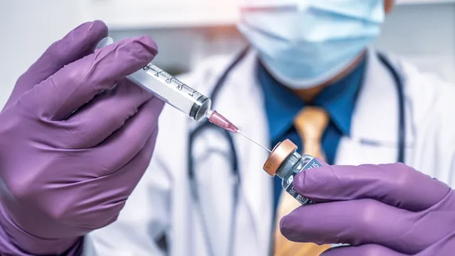 Researcher working on a cancer vaccine